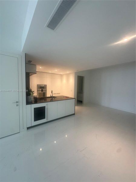 Spacious, unfurnished interior of a new home in Aston Martin Residences, Miami (Image 9).
