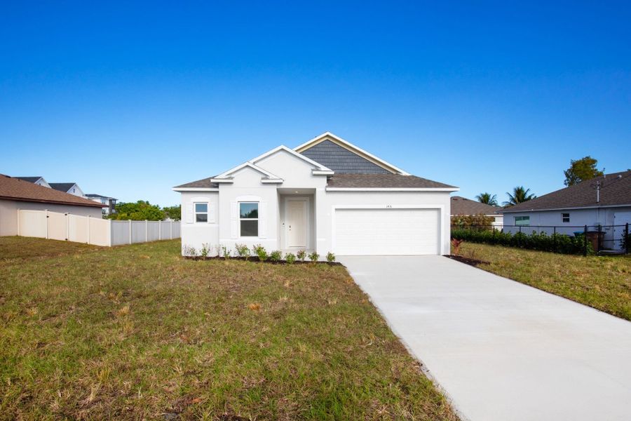 Front exterior of a new home in Cape Coral, Cape Coral, FL, highlighting curb appeal (Image 15).