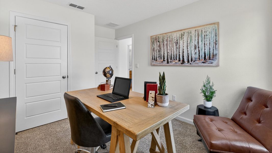Representative furnished interior of a home built from the HARPER by D.R. Horton in The Arbors, Jacksonville (Image 27).