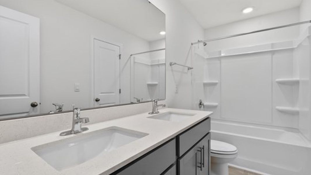 Furnished interior view inside a new home in Shahbain Reserve, Raeford (Image 8).