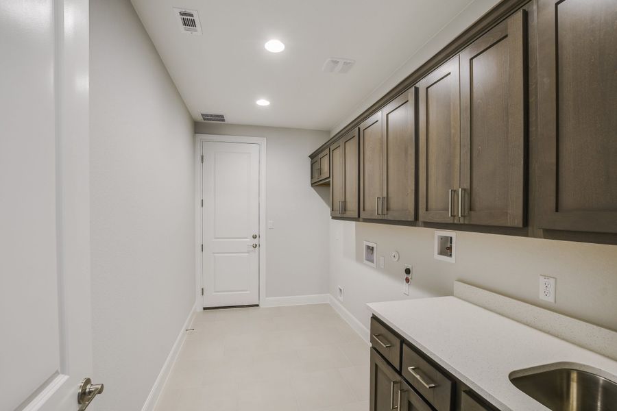 Representative furnished interior of a home built from the San Simeon I by Giddens Homes in Clearwater Ranch, Liberty Hill (Image 344).