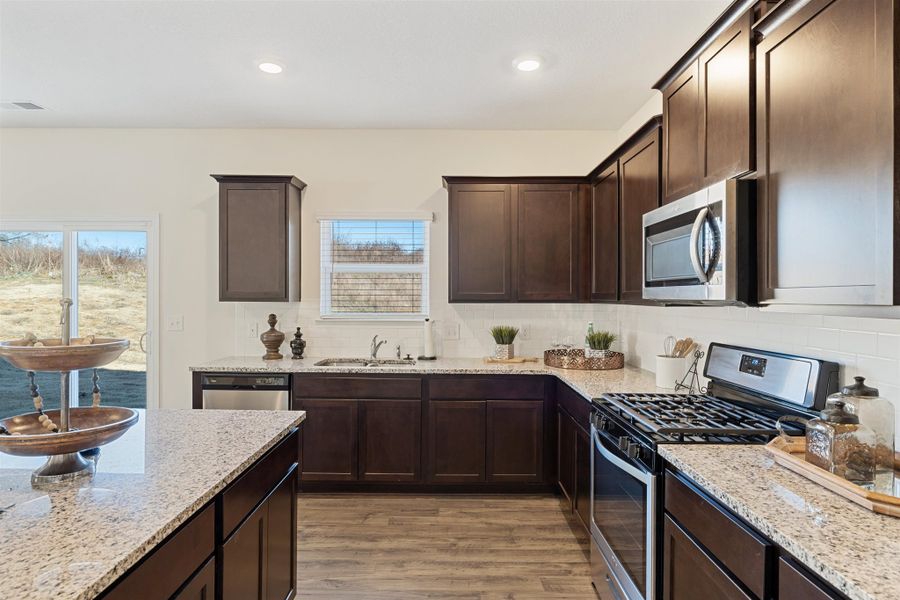 Representative furnished interior of a home built from the Hanover by D.R. Horton in Hillcrest Landing, McDonald (Image 7).