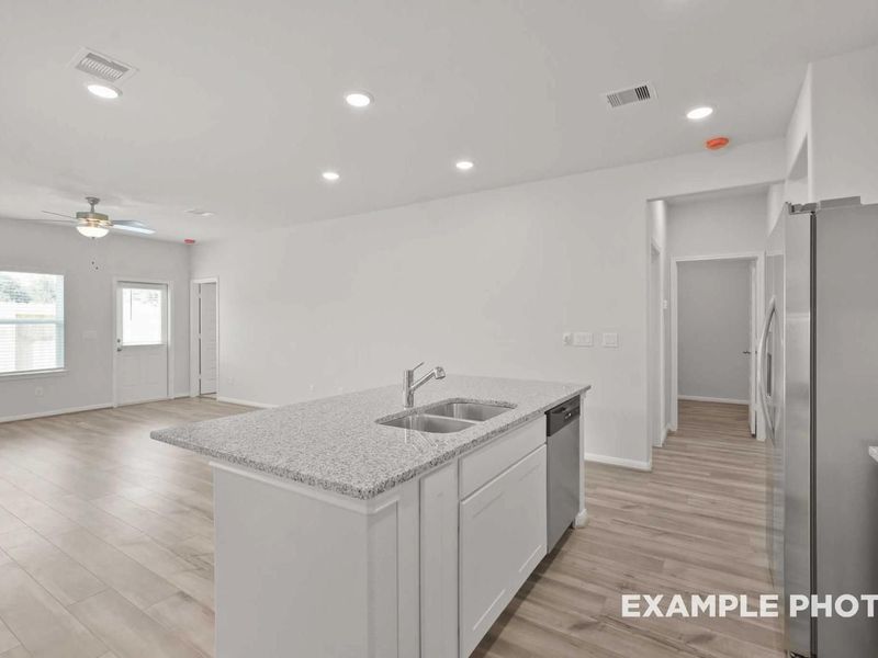 Furnished interior view inside a new home in Spring Branch Crossing, Conroe (Image 3).