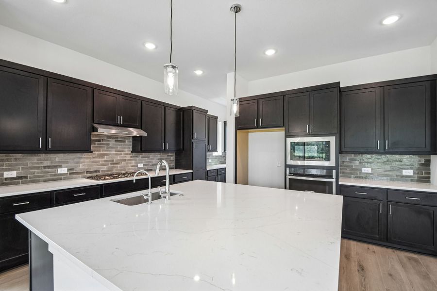 Furnished interior view inside a new home in Freedom at Anthem, Kyle (Image 4).