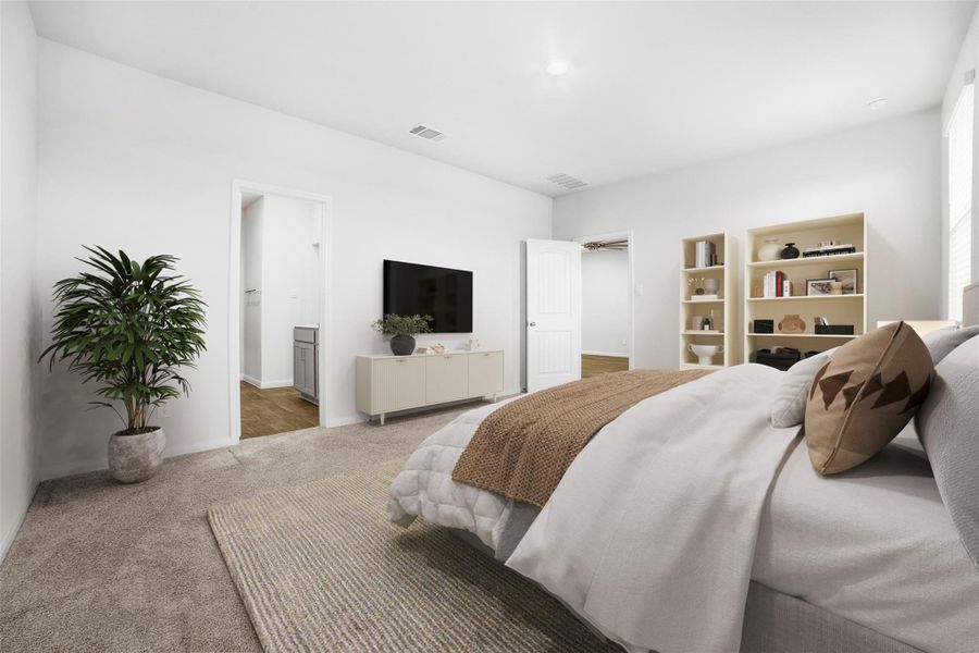 Bedroom featuring carpet flooring and ensuite bathroom Bedroom featuring carpet flooring and ensuite bathroom