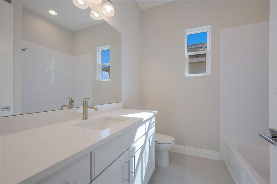 Furnished interior view inside a new home in The Willows, Parrish (Image 9).