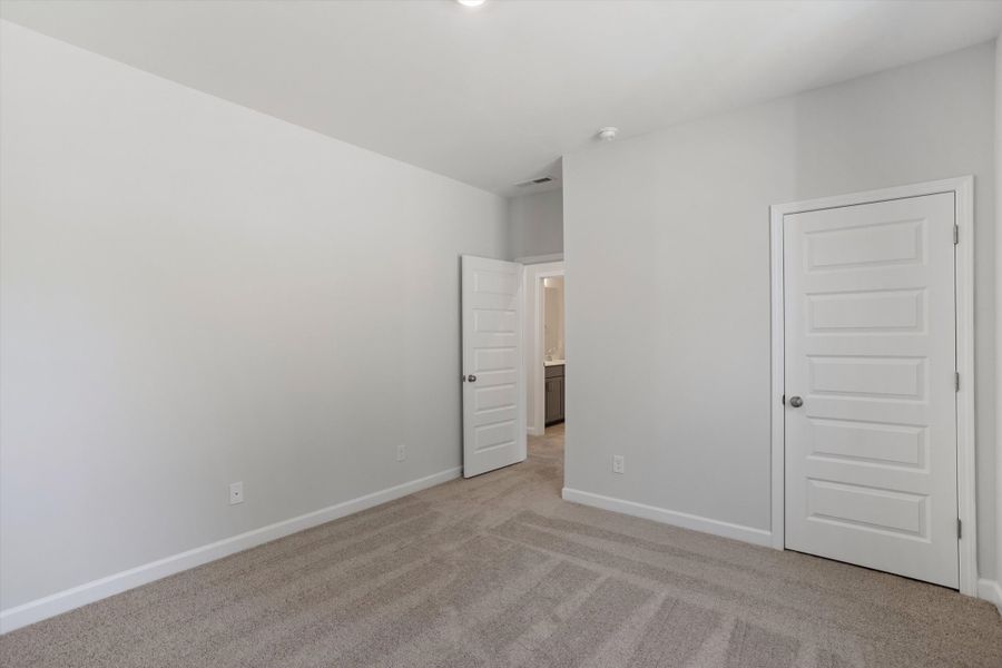 Spacious, unfurnished interior of a new home in Ovation at Sweetbrier, Durham (Image 28).