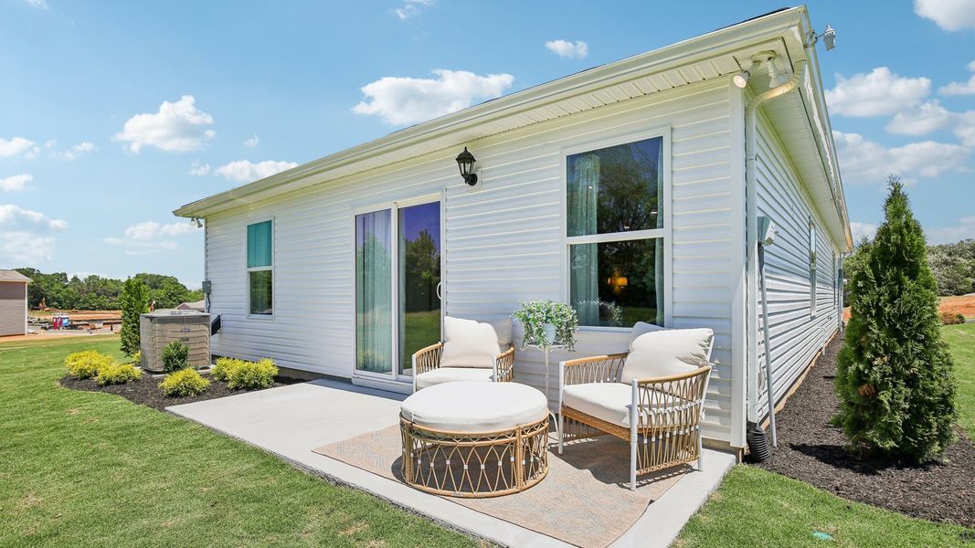 Exterior details and patio area of a home in Saddle Trace, Lewisburg (Image 25).