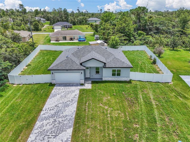 Front exterior of a new home in , Ocala, FL, highlighting curb appeal (Image 2). Front exterior of a new home in , Ocala, FL, highlighting curb appeal (Image 2).