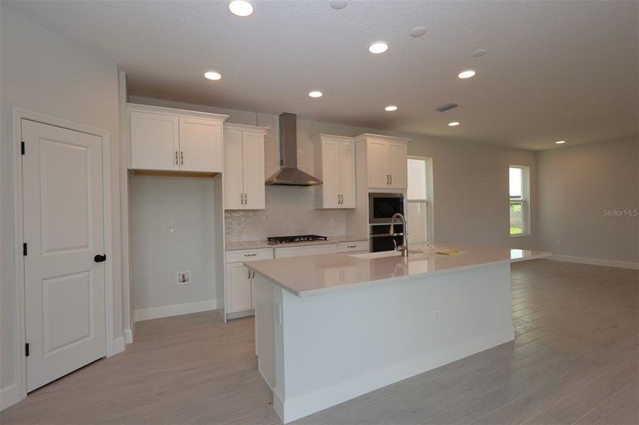 Furnished interior view inside a new home in Lake Star at Ovation, Winter Garden (Image 9).