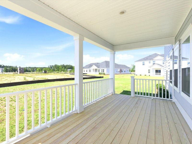 Exterior details and patio area of a home in The Coves at Lakes of Cane Bay, Summerville (Image 17). Exterior details and patio area of a home in The Coves at Lakes of Cane Bay, Summerville (Image 17).