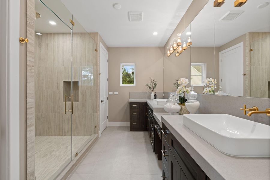 primary restroom/ womens vanity/ linen closet/ oversized shower