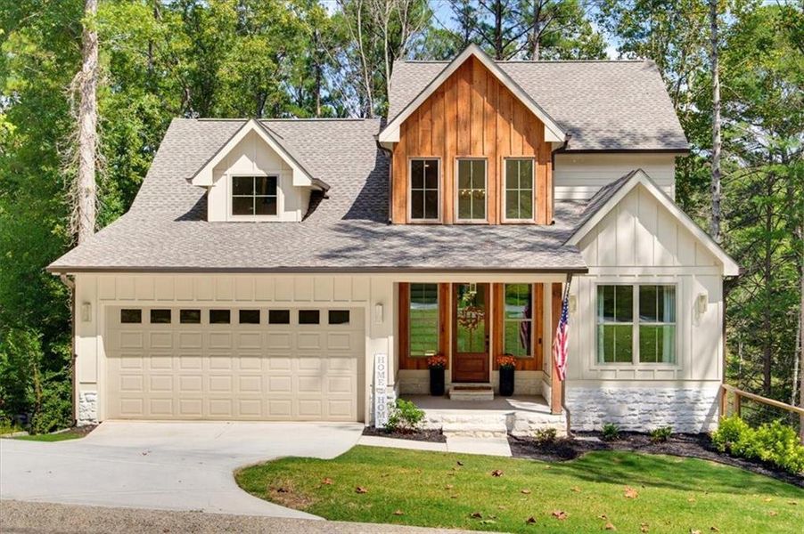 Front exterior of a new home in , Ball Ground, GA, highlighting curb appeal (Image 23).