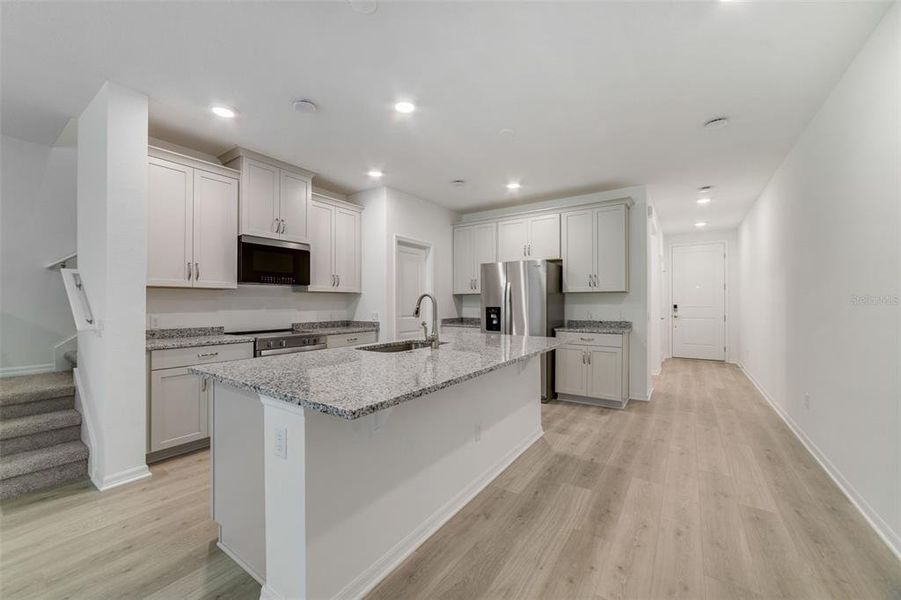 Furnished interior view inside a new home in Towns at Greenleaf, Oviedo (Image 7).