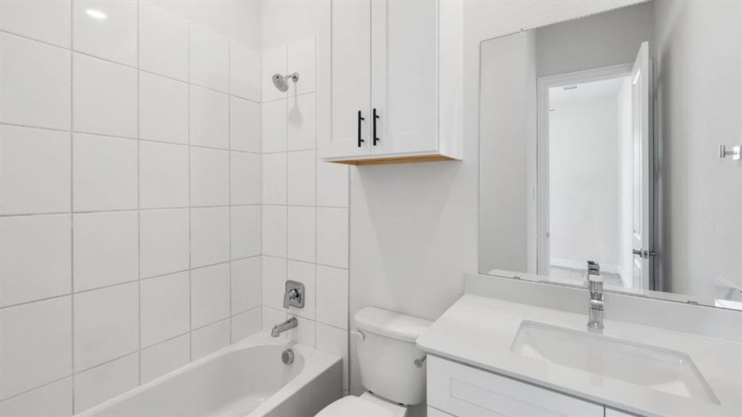 Furnished interior view inside a new home in Mustang Square, Plano (Image 5). Furnished interior view inside a new home in Mustang Square, Plano (Image 5).