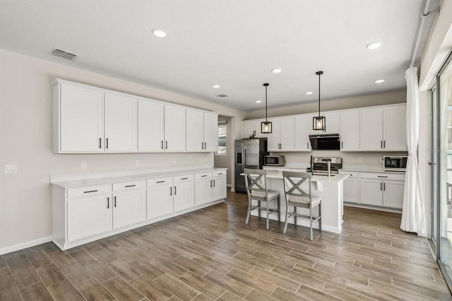 Furnished interior view inside a new home in Seasons at Lakeside Forest, Tavares (Image 14).