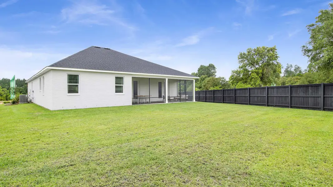 Exterior details and patio area of a home in Golden Gate, Naples (Image 4).