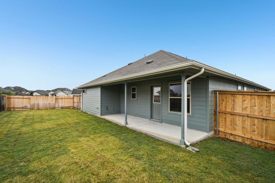 Exterior details and patio area of a home in Crosswinds, Kyle (Image 4).