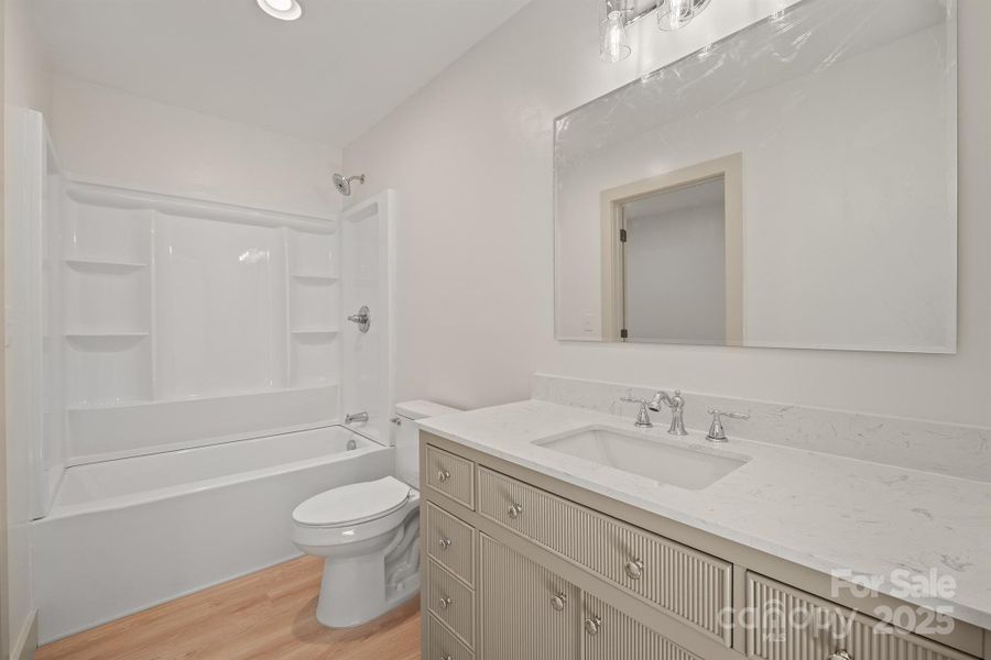 Furnished interior view inside a new home in , Newton (Image 6).