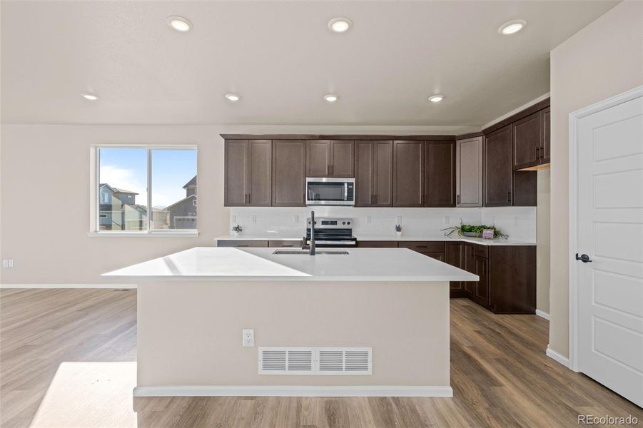 Furnished interior view inside a new home in Painted Prairie, Aurora (Image 7).