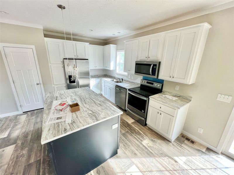 Furnished interior view inside a new home in , Taylorsville (Image 3).