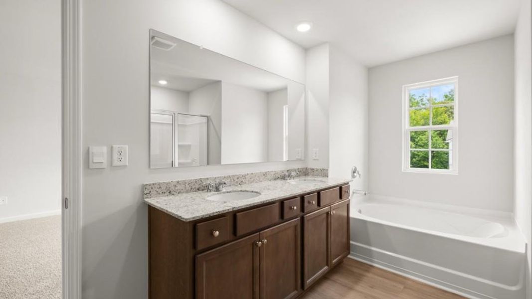 Furnished interior view inside a new home in Northwoods at Mirror Lake, Villa Rica (Image 5).
