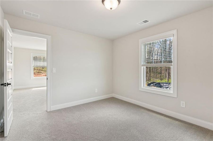 Spacious, unfurnished interior of a new home in Hemingway - Reserve Series, Cumming (Image 45).