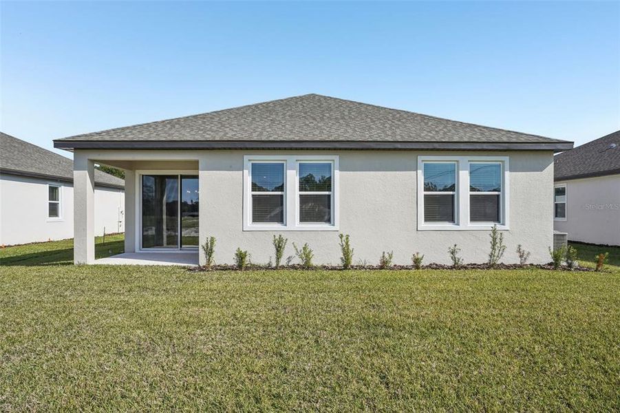 Exterior details and patio area of a home in Legends Preserve - Signature Series, Daytona Beach (Image 25).