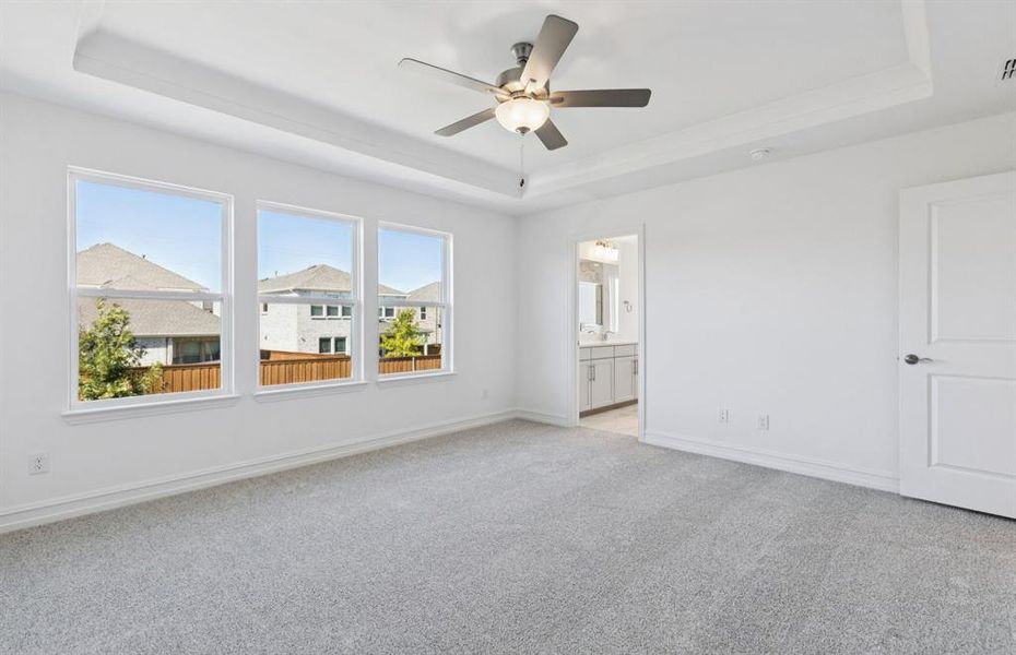 Spacious owner's suite with large windows