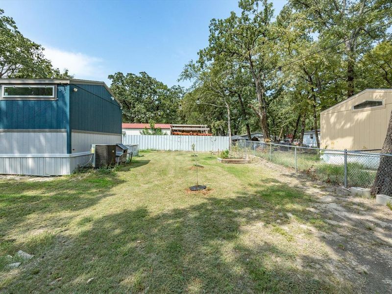 Front exterior of a new home in , Gun Barrel City, TX, highlighting curb appeal (Image 20). Front exterior of a new home in , Gun Barrel City, TX, highlighting curb appeal (Image 20).