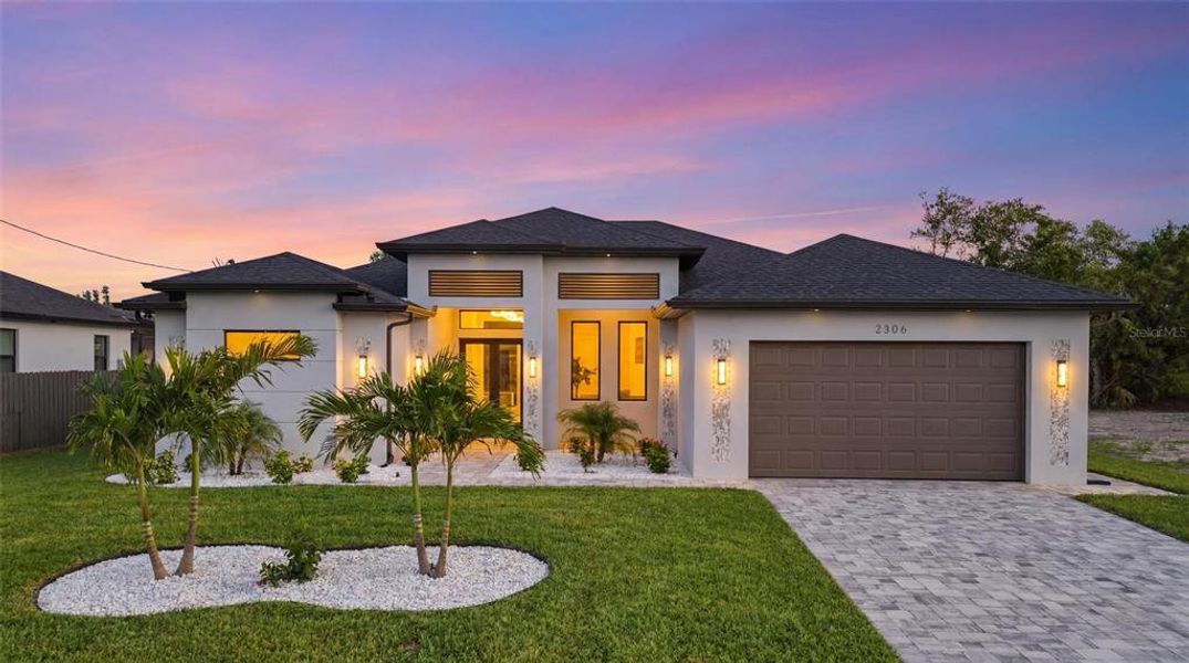Front exterior of a new home in , Cape Coral, FL, highlighting curb appeal (Image 27).