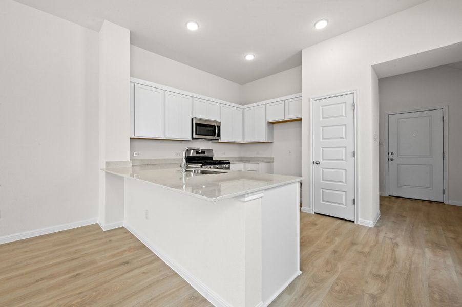 Furnished interior view inside a new home in Trinity Ranch, Elgin (Image 9).