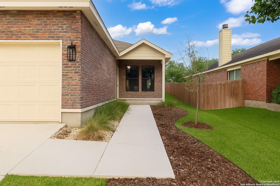 Front exterior of a new home in , San Antonio, TX, highlighting curb appeal (Image 18). Front exterior of a new home in , San Antonio, TX, highlighting curb appeal (Image 18).
