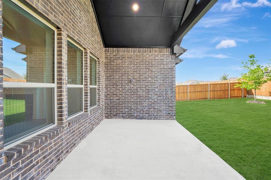 Exterior details and patio area of a home in Wellington, Haslet (Image 2). Exterior details and patio area of a home in Wellington, Haslet (Image 2).