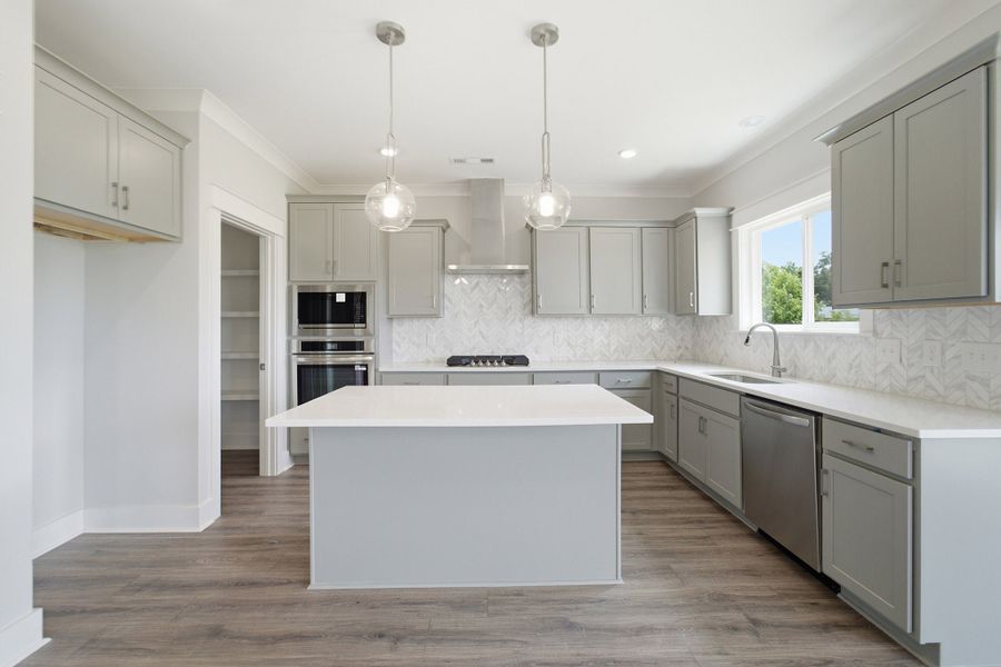 Furnished interior view inside a new home in Aden Woods, Fairview (Image 7).