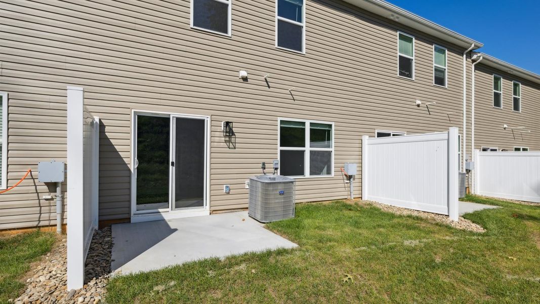 Exterior details and patio area of a home in Cherokee Crossing, Kodak (Image 2).