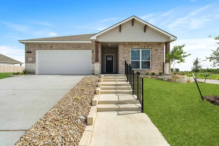 Front exterior of a new home in Hartrick Ranch, Temple, TX, highlighting curb appeal (Image 1). Front exterior of a new home in Hartrick Ranch, Temple, TX, highlighting curb appeal (Image 1).
