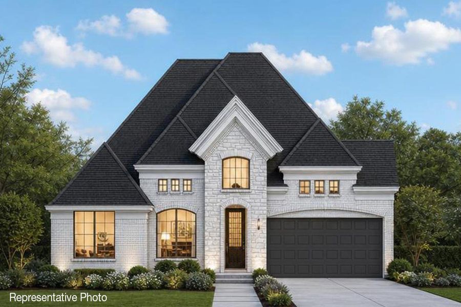 Representative exterior photo of a completed home built from the Brandonwood by Grand Homes in Edgewater, Fate, TX (Image 18). Representative exterior photo of a completed home built from the Brandonwood by Grand Homes in Edgewater, Fate, TX (Image 18).