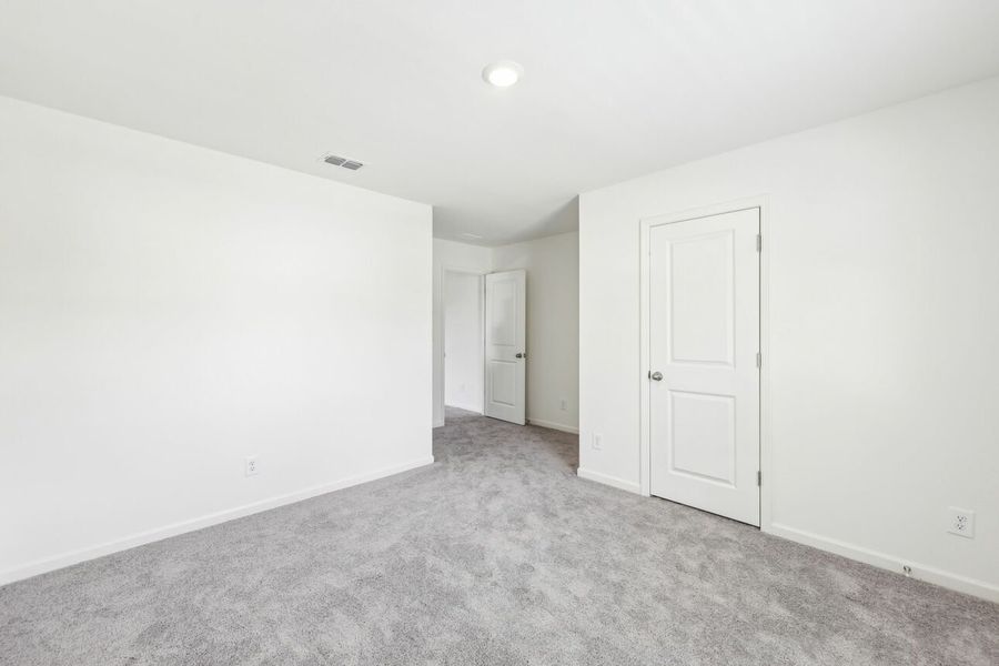 Representative unfurnished interior of a home built from the Galileo by Starlight Homes in Harrington Trails at The Canopies, New Caney (Image 38).