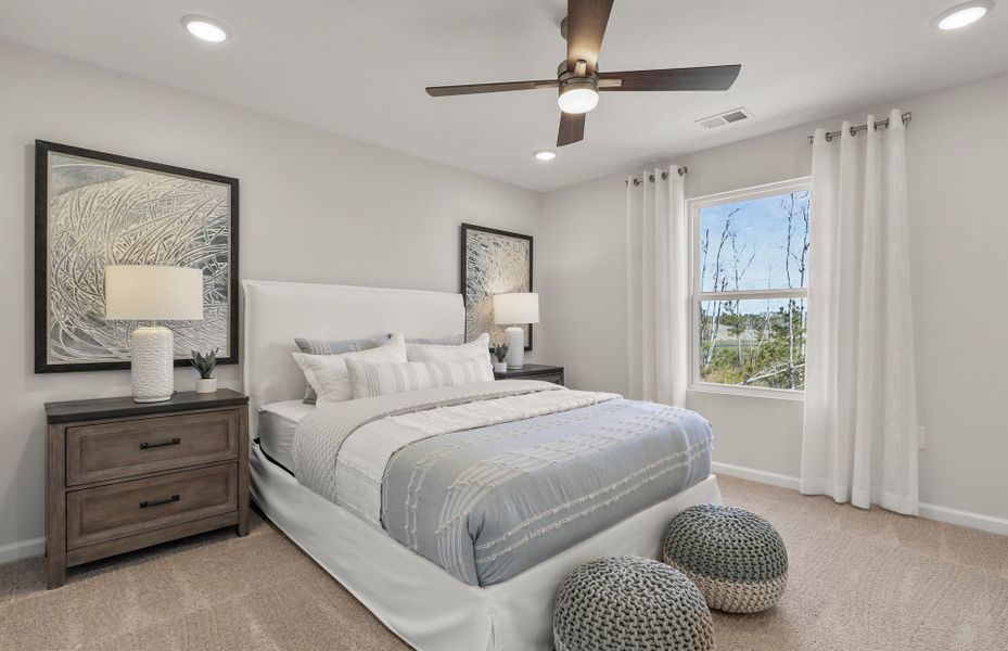 Relax in this cozy guest room with decorative ligh