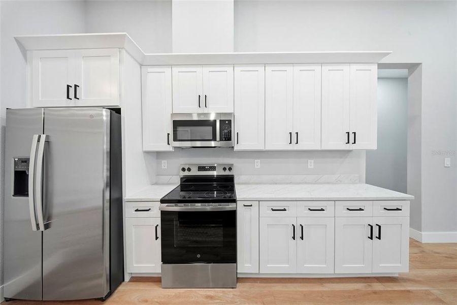 Furnished interior view inside a new home in , Punta Gorda (Image 10).