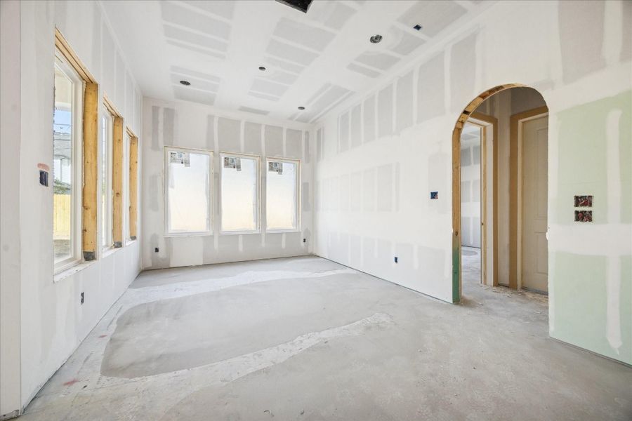 Positioned between the kitchen and living areas, the dining space is wrapped in large windows that bring in abundant natural light. Sightlines extend to the covered patio and backyard, making the room feel open and connected while providing an inviting backdrop for gatherings and daily dining. Positioned between the kitchen and living areas, the dining space is wrapped in large windows that bring in abundant natural light. Sightlines extend to the covered patio and backyard, making the room feel open and connected while providing an inviting backdrop for gatherings and daily dining.