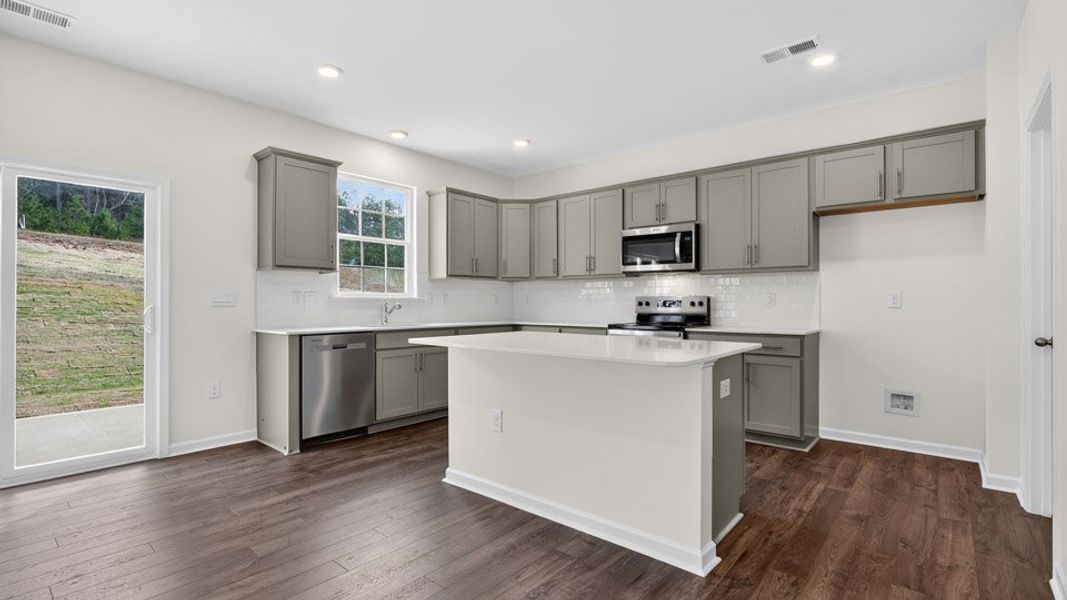 Furnished interior view inside a new home in Olive Branch, Wilson's Mills (Image 6).