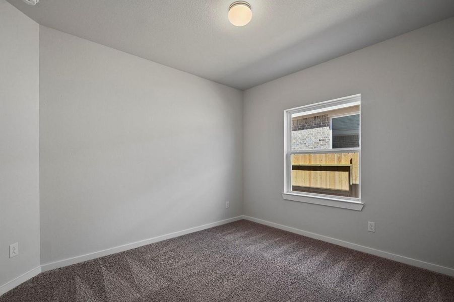 Spacious, unfurnished interior of a new home in Sunterra, Katy (Image 17).