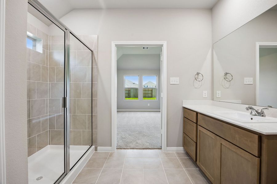Primary Bathroom in the Sabine home plan by Trophy Signature Homes – REPRESENTATIVE PHOTO Primary Bathroom in the Sabine home plan by Trophy Signature Homes – REPRESENTATIVE PHOTO