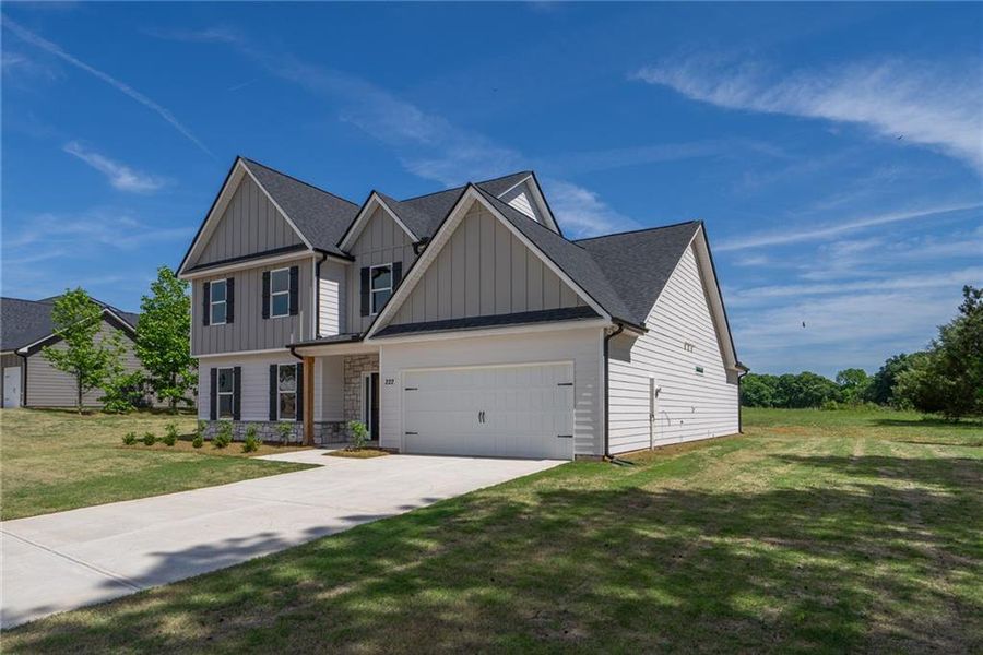 Front exterior of a new home in , Good Hope, GA, highlighting curb appeal (Image 28).