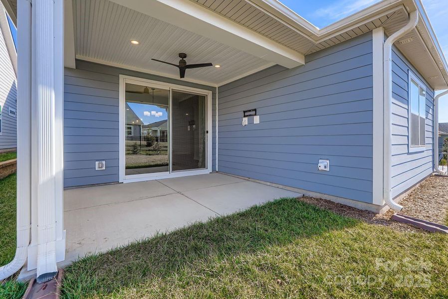 Exterior details and patio area of a home in Trilogy® Lake Norman, Denver (Image 18).