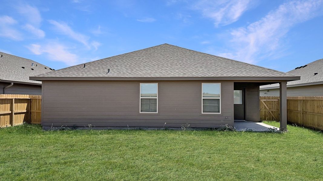 Front exterior of a new home in London Towne, Corpus Christi, TX, highlighting curb appeal (Image 2). Front exterior of a new home in London Towne, Corpus Christi, TX, highlighting curb appeal (Image 2).
