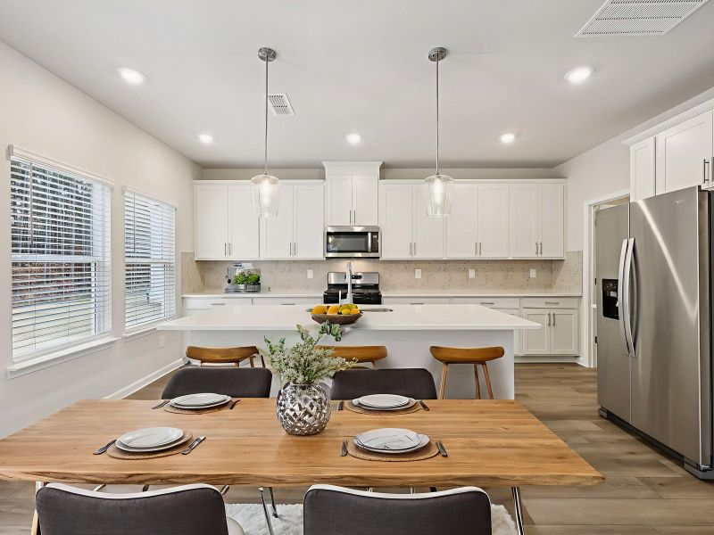 Furnished interior view inside a new home in Northwoods at Mirror Lake, Villa Rica (Image 4).