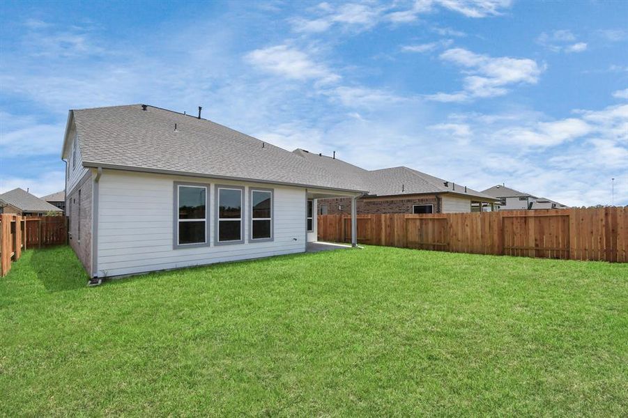 Sample photo of completed home with similar floor plan. Actual colors and selections may vary.